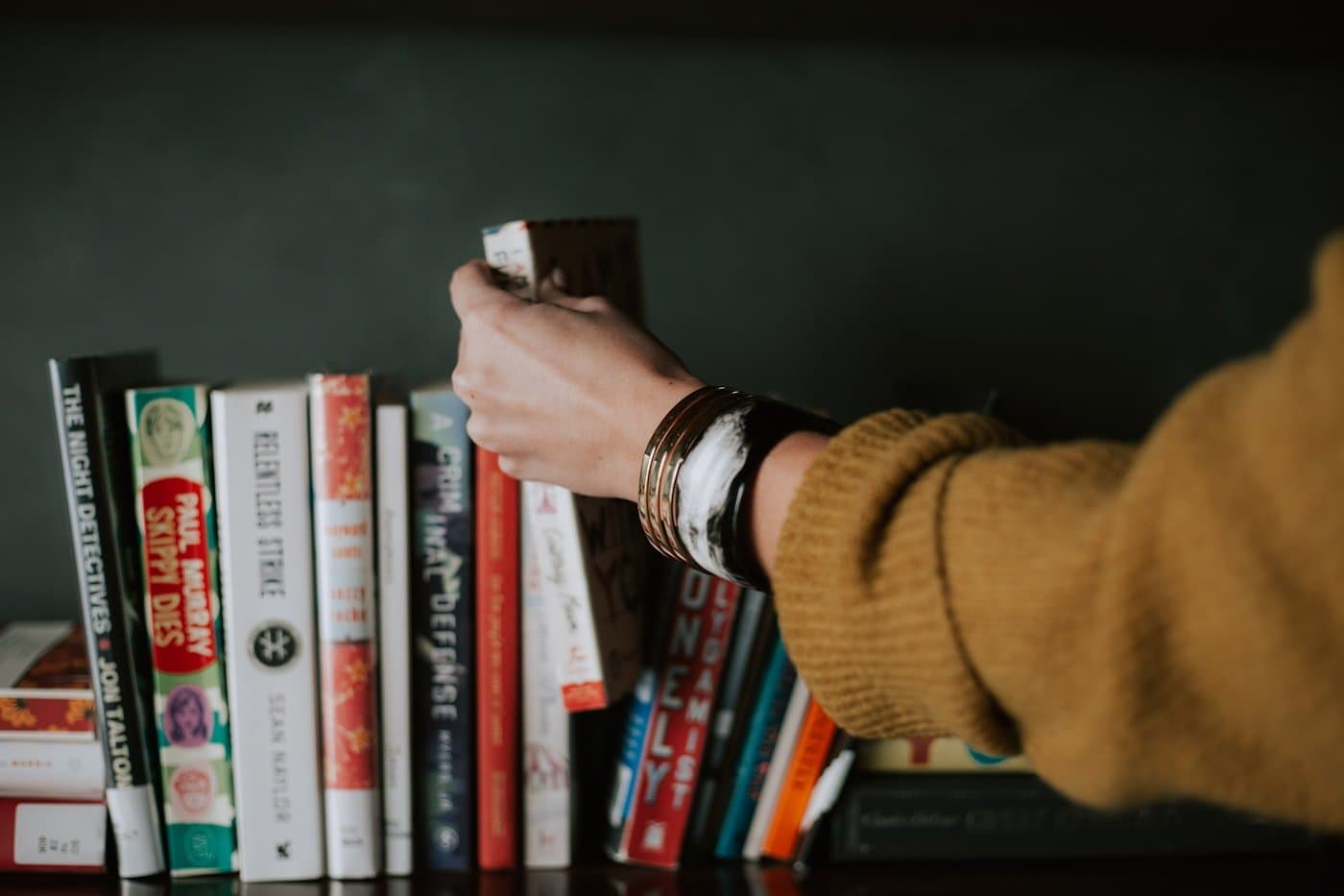 A student reading competitive exam preparation material